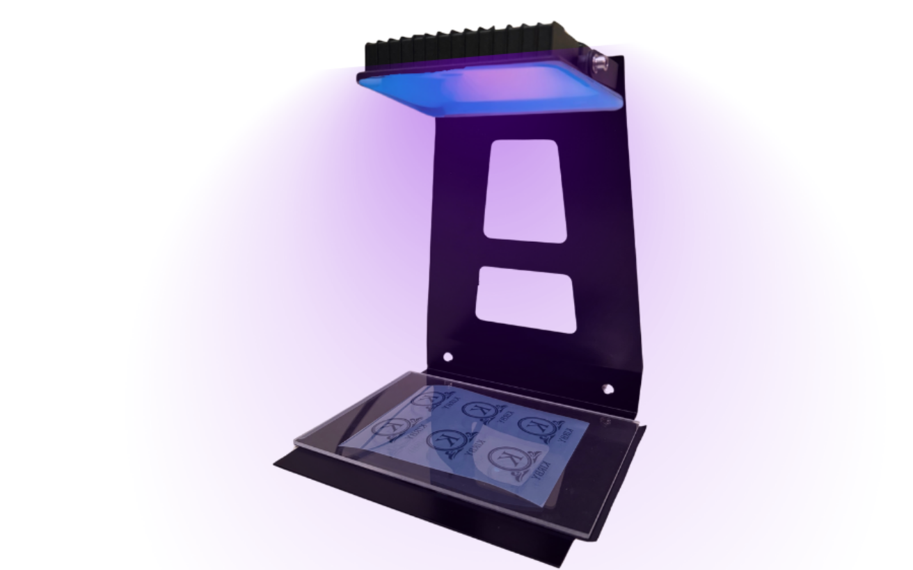 UV Light exposure unit for developing Aero-Etch sand-carving stencils.