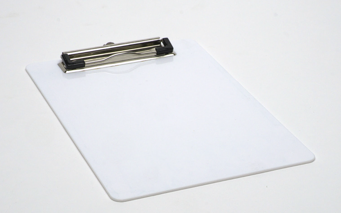 White clipboard with a metal clip for use in Aero-Etch stencil film development.
