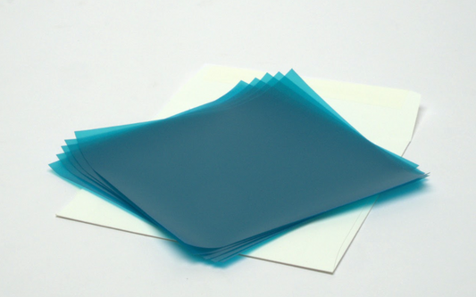 Stack of blue translucent sheets on a white background