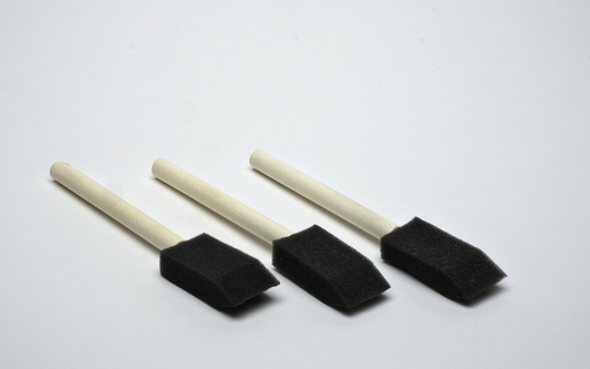 Three black foam brushes with wooden handles for Aero_Etch stencil development